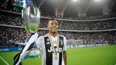 Alex Sandro with the Italian Super Cup. Getty