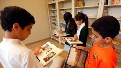 AbdelAziz Al Amir and Abdul Rahman Mohammed learn Arabic at the Iqra Arabic Centre in Dubai. Satish Kumar / The National