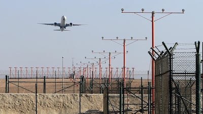 After clear weather returns, an airliner takes off from Abu Dhabi International Airport. Ravindranath K / The National