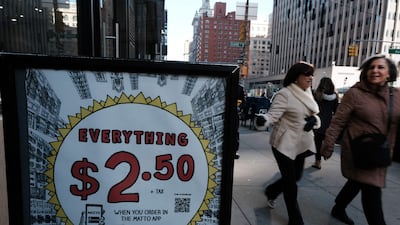 A store in Manhattan promotes its prices. US consumer prices rose by 0.4 per cent in February from January, according to Labour Department data. AFP