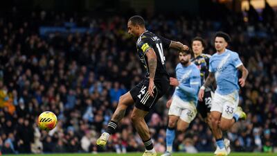 Leeds' Lukas Nmecha scores from the rebound after his original penalty was saved. PA