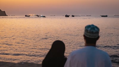 Ships wait off the coast of Oman, near the Strait of Hormuz. Muscat does not rely on the waterway for its exports. Getty Images