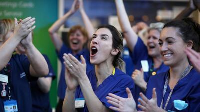 NHS workers applaud outside Chelsea and Westminster Hospital during the Clap for our Carers campaign in Britain. Reuters