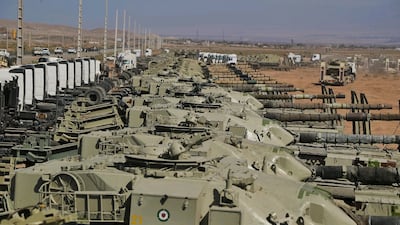 Iranian Army tanks lined up for the exercise. Iran said it would not tolerate the presence of Israel near its border and would 'carry out any necessary action in this regard'. EPA