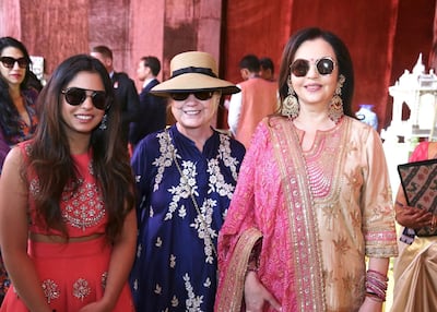 Hillary Clinton with Isha Ambani and Nita Ambani. Reuters