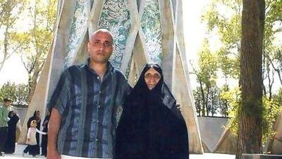 Blogger Sattar Beheshti with his mother in a photo from his Facebook page.