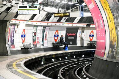 A man wearing a protective face mask at Bank Station on the weekend. AP