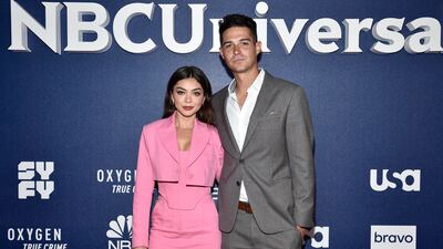 Sarah Hyland, left, and Wells Adams married in an outdoor ceremony in California on August 20. Invision / AP