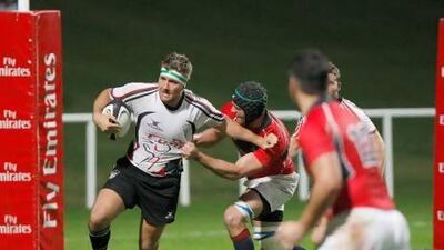 Renier Els, left, has been proud of his team who went straight from work to the international against Hong Kong. Mike Young / The National