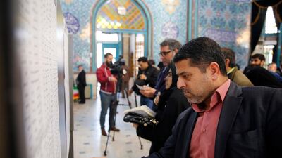 Iranians fill in their ballot papers at a polling station during the parliamentary elections in Tehran, Iran. Iranians head to polls amid a worsening economic crisis and escalating tensions with the United States. EPA