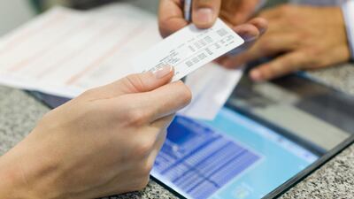 The Dubai resident's employer says it will cancel the health policy immediately. Getty Images