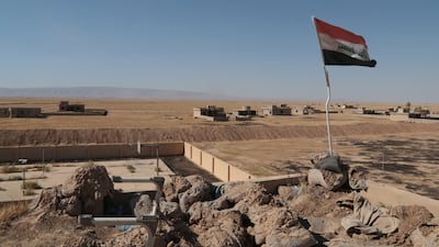 A view of Mount Sinjar from the roof of Kocho's school, which was once occupied by ISIS but is now abandoned. Florian Neuhof for The National