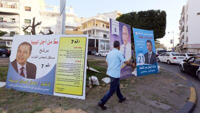 Parliamentary campaign posters in the capital of Tripoli on June 22, 2014. Libyans are to elect a new parliament on Wednesday, in a vote seen as crucial for the future of a country hit by months of political chaos and growing unrest. Mahmud Turkia/AFP Photo