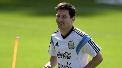 Lionel Messi trains with Argentina on Friday ahead of their Saturday match with Iran at the 2014 World Cup. Juan Mabromata / AFP / June 20, 2014