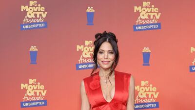 Bethenny Frankel in a red mini dress. AFP