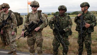 American and Colombian paratroops rehearse securing an airfield at Tolemaida Air Base in Colombia. AP