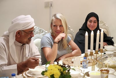 Jana Vintrova chats with Dr Khaled Al Mansoori during an iftar held in Ras Al Khaimh which served up plenty of food and friendship. Chris Whiteoak / The National