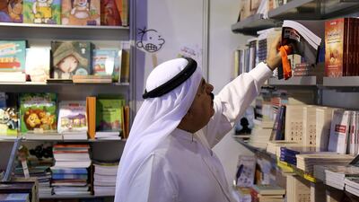 A visitor browses books at the Sharjah International Book / Satish Kumar