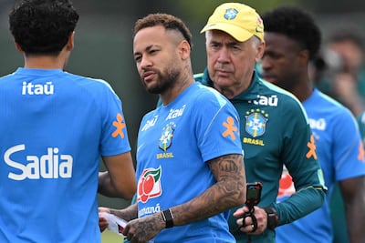 Carlo Ancelotti, right, said Neymar has performed well in training and could play a part in the game against Scotland. AFP