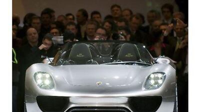 The new Porsche 918 Spyder hybrid is presented at the Volkswagen Group event in Geneva, Switzerland, Monday, March 1, 2010. Around 250 exhibitors from 30 countries are showing 100 car premieres at the International Geneva Motor Show until March 14. (AP Photo/Martin Meissner)