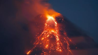 Lava flows down the slopes of Mount Mayon on January 26, 2018, as seen from Legazpi city in Albay province of the Philippines. Bullit Marquez / AP Photo