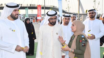 Sheikh Mohammed bin Rashid, Vice President and Ruler of Dubai, on Saturday speaks to Ohood bint Khalfan Al Roumi, Minister of State for Happiness, while attending the events of the Inaugural Happiness Journey, which included the Happiness Walk from the Dubai Water Canal to the BOXPARK. Sheikh Mohammed was accompanied by Mohammad bin Abdullah Al Gergawi, Minister of Cabinet Affairs and the Future, as well as other senior officials. Wam