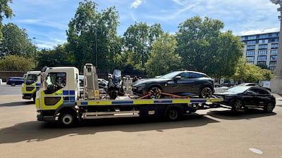 A Ferrari Purosangue is taken away. Photo: Metropolitan Police
