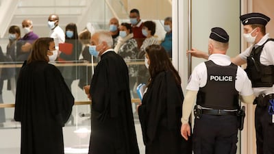 Lawyers arrive at the courtroom on the opening day of the trial of the January 2015 Paris attacks against Charlie Hebdo satirical weekly,. Reuters