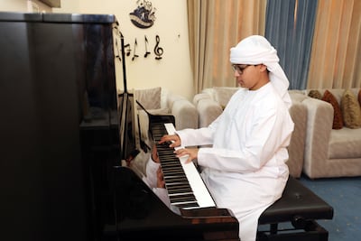 Playing the piano has helped Zayed enormously. Photo: Chris Whiteoak / The National