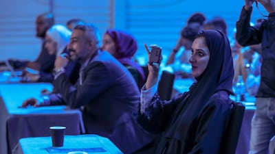 Delegates and guests listen to a presentation at the inaugural Abu Dhabi 6G Summit. Victor Besa / The National