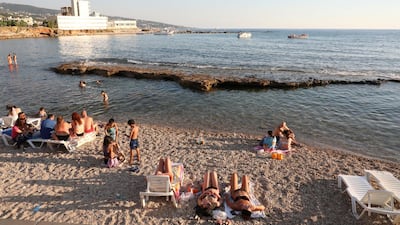 Sunbathing in Batroun. Reuters
