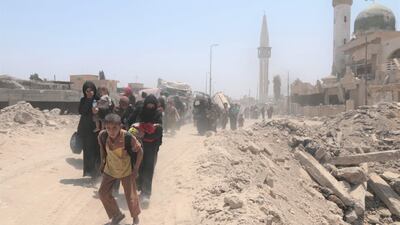 Exhausted civilians flee Mosul's Old City in the final days of the fighting on July 10, 2017. Florian Neuhof