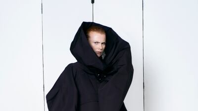 At Balenciaga, simple jackets were reimagined with sweeping edges of taffeta.