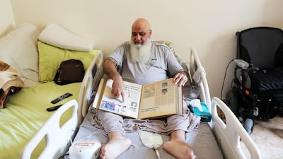 Mohammed Ishaq, 56, has been confined to this room for the past four months. His doctor advised that he no longer use his wheelchair, as they attempt to heal the seeping wound of a pressure sore near his hip.