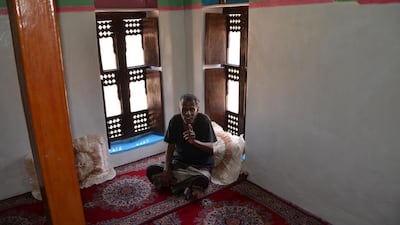 The only thing that kept Abu Baker Ahmad Bamousa Al Amoudi in the nearly deserted village is his father's will. He commanded him stay put for good. Courtesy Saeed Al-Batati