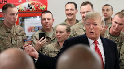 President Donald Trump speaks to US troops at Al Asad airbase in Iraq on December 26, 2018. Reuters