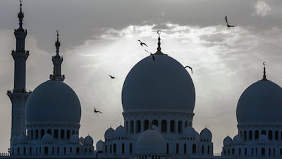 Sheikh Zayed Grand Mosque at dawn in Abu Dhabi on the first morning of Ramadan. Victor Besa / The National