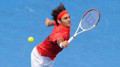 Roger Federer in full flow against Ivo Karlovic.