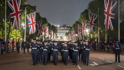 A procession down The Mall during the early morning rehearsal.