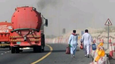 Jaywalkers on Emirates Road near Dubai Sports City.