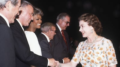 Perry Como, Frank Sinatra and Dionne Warwick serenaded the queen on her 1983 California visit and George Burns acted as master of ceremonies. Getty Images