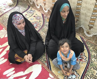 Ruqayya with her mother and an aunt. Zeina Awad / Unicef Iraq