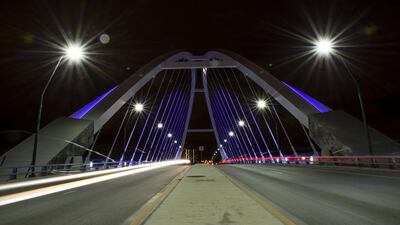 Minneapolis turned on the purple with many bridges and buildings illuminated. Among them was Lowry Avenue Bridge, which crosses the Mississippi River. Stephen Maturen / Getty Images / AFP