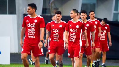 Paraguay players, among them Junior Alonso, left, and Miguel Almiron, third left, take part in a training session. AFP