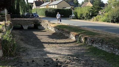 The exposed riverbed of the Thames after it dried up in Ashton Keynes, about 10km from its source. Reuters