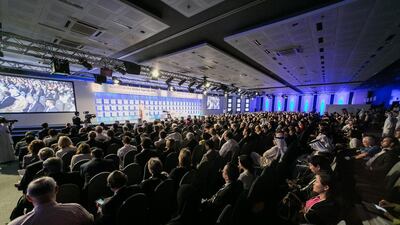 Above, participants during the opening plenary of the World Economic Forum's Summit on the Global Agenda being held in Abu Dhabi. Courtesy World Economic Forum