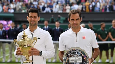 Novak Djokovic, left, beat Roger Federer in an epic Wimbledon final in 2019. The pair meet again in the Australian Open semi-finals on Thursday. AFP