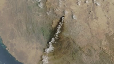 A satellite image shows smoke rising from the Saudi Aramco distribution centre in Abha Bulk, Saudi Arabia. Nasa/Reuters