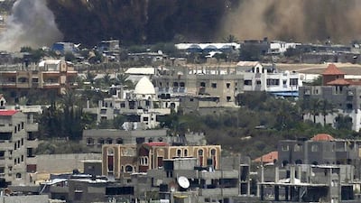 Smoke is seen following what police said was an Israeli air strike in Rafah in the southern Gaza Strip on July 8, 2014. Reuters
