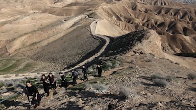 Ultra-Orthodox Jewish girls trek near the Israeli settlement of Mitzpe Yeriho, overlooking the Palestinian city of Jericho, in the occupied West Bank. EPA